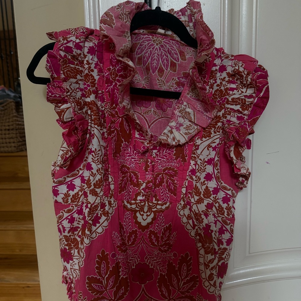 Love the label.  Tatiana sleeveless.  Ruffle top.    Worn 2 times